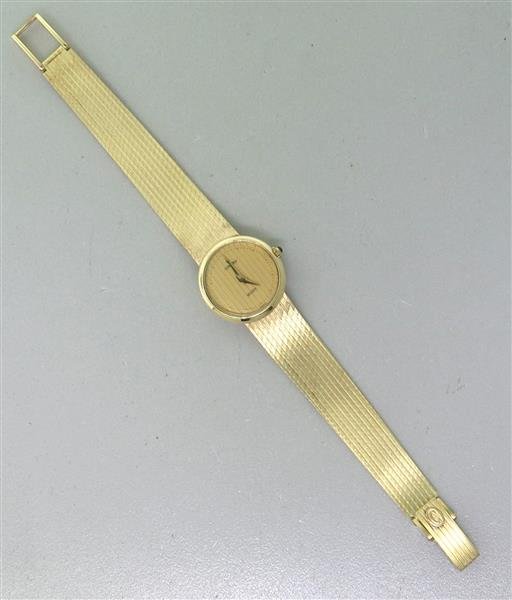 Concord 14k Gold Watch Bracelet: 14k gold case - 21mm in diameter, sapphire crown. Quartz - not running. 14k gold band and buckle - 6 1/2" long. weight of the watch - 30.7grWatches are guaranteed to be in running order, if descr