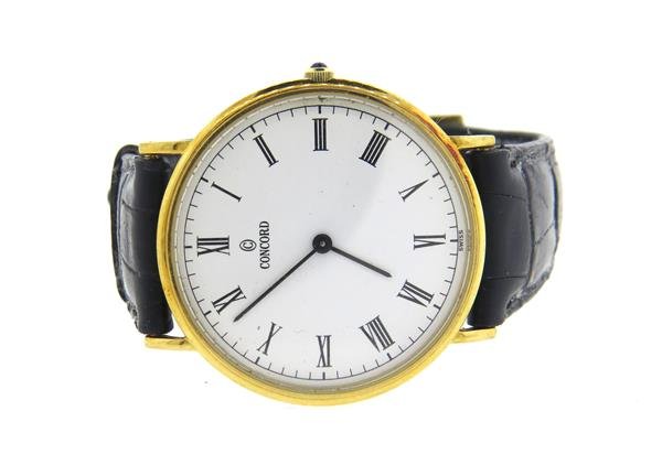 Concord 18k Gold Leather Band Watch: 18k gold case - 31mm in diameter. White dial with black roman numeral markers, Quartz movement - not running. Case back is loose.Watches are guaranteed to be in running order, if described as such, at