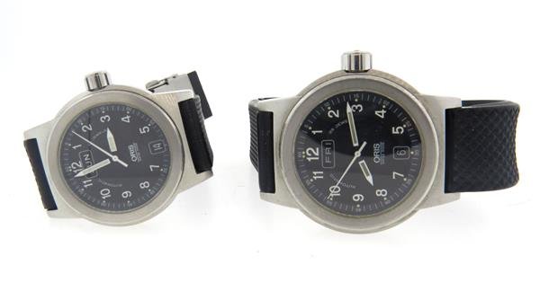 Oris Automatic Day Date Watch Lot of 2: 2 Oris watches - cases are 41mm and 35mm in diameter. Automatic movements - one running, one not. Day at 12 o'clock, date at 6 o'clock. Both original buckles, one band is broken.Watches are gu
