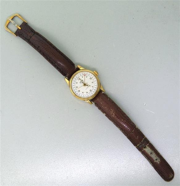 Oris Automatic Calendar Watch: Case - 26mm in diameter. Automatic 17 jewel movement - running order. dial with calendar, center second hand, gold tone arabic numerals. Skeleton back case.Watches are guaranteed to be in running orde