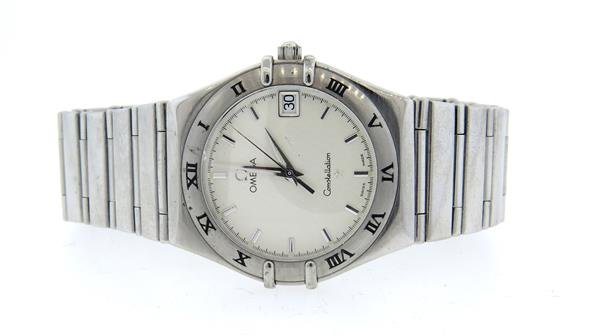 Omega Constellation Stainless Steel Watch: Case - 33mm in diameter, bezel with black roman numeral markers, center second hand, date at 3 o'clock. Quartz movement - not running.Watches are guaranteed to be in running order, if described as