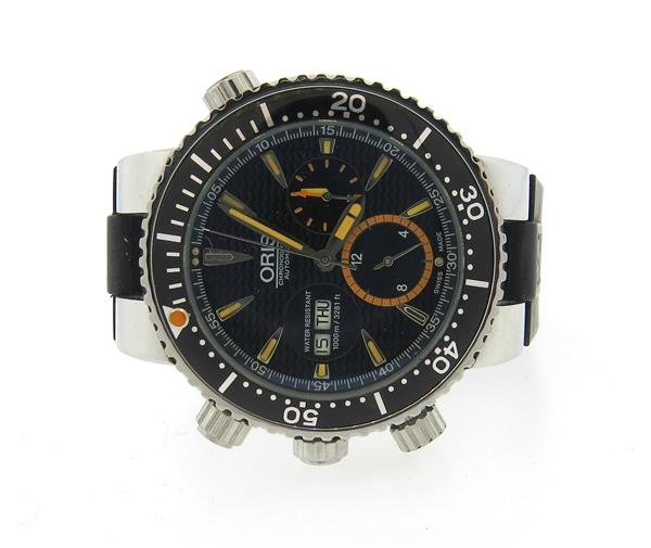 Oris Chronograph Day Date Automatic Watch 0558 2000: Case - 46mm in diameter and is 18mm thick. Case marked on side 0558/2000. Dial with three reg. chronograph, day date at 9 o'clock. Automatic movement -not running. Original rubber band and buckle.