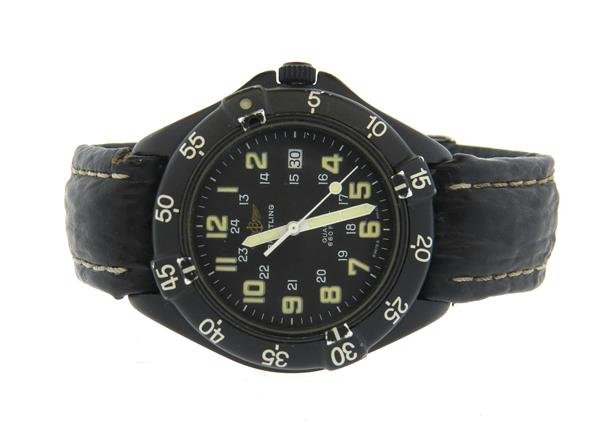 Breitling Colt Military Watch ref. 80180: Case - 38mm in diameter. Quartz movement - not running. Black dial with luminous hands and markers, date at 3 o'clock. Breitling steel buckle.Watches are guaranteed to be in running order, if desc