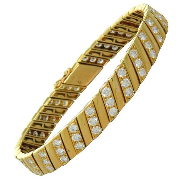 1980s Van Cleef Arpels Paris Gold Diamond Bracelet: Vintage 1980s Van Cleef and Arpels Paris Bracelet with approx. 6.00ctw VVS/VS- FG diamonds. Bracelet is 7" long and 9mm wide. Marked - Van Cleef Arpels,750,32108. Weight - 34.9grColor stones have