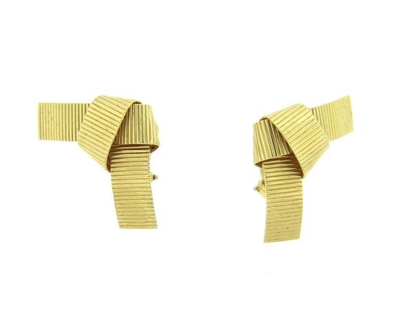 McTeigue 14k Gold Twist Earrings: Earrings are 33mm x 14mm. Marked 14k and makers mark. weight - 9.6grColor stones have not been tested for color and clarity enhancement,unless stated otherwise. Watches are guaranteed to be in running