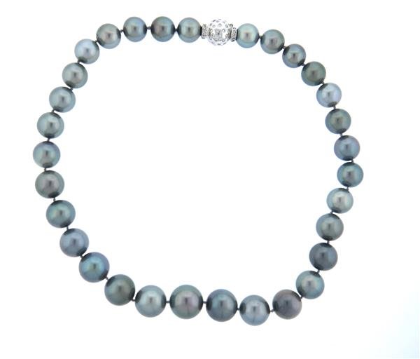 18k Gold Diamond Tahitian Pearl Necklace: Necklace is 18 1/4" long. Tahitian gray pearls - 12.08mm to 15.94mm in diameter. Diamond clasp - approx. 0.45ctw in diamonds. Marked 18k. Weight - 112.9 gramsGemstones have not been graded for co