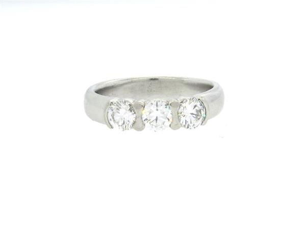 Tiffany & Co Platinum Three Stone 1.50ctw Diamond: Ring size 10, ring is 4.7mm wide. Three round brilliant diamonds - each approx. 0.50ctw. total diamond weight approx. 1.50ctw (stones are a bit loose) VS/GH. Marked Tiffany & Co,21359823,pt950. We