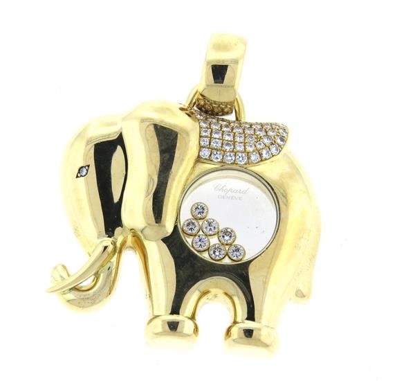 Large Chopard Happy Diamond Elephant Pendant: Pendant is 47mm wide x 60mm long with bale. Set with 7 signature floating diamonds and elephant top decorated with round diamonds. Total diamond weight approx. 2.00ctw. Marked LUC,Chopard,750,2047. We