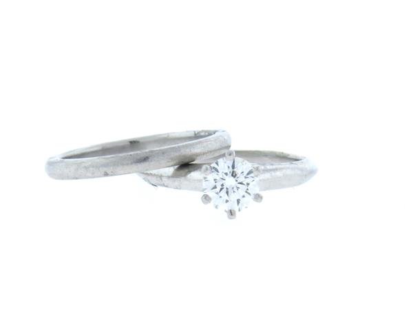 Tiffany & Co Platinum 0.58ct VVS1 G Diamond: Engagement ring size 4 3/4, wedding band - 5. Diamond - 0.58ct VVS1/G. Marked - Tiffany & Co,pt950,D17033, .58, Comes with Tiffany & Co diamond cert. weight - 7.3 grams.Gemstones have not been