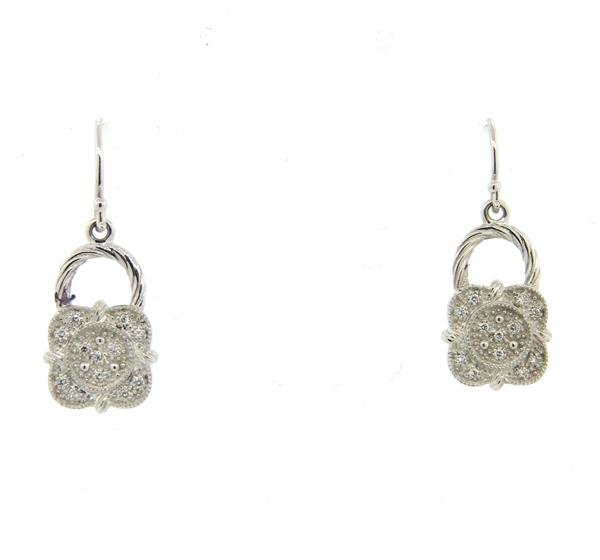 New Charriol Flamme 18k Gold Diamond Earrings: Earrings are 27mm x 10mm. Set with diamonds. Marked Charriol, 750. Weight - 5.0 grams. Come with Charriol pouch.Gemstones have not been graded for color and clarity ,and tested for clarity and color e