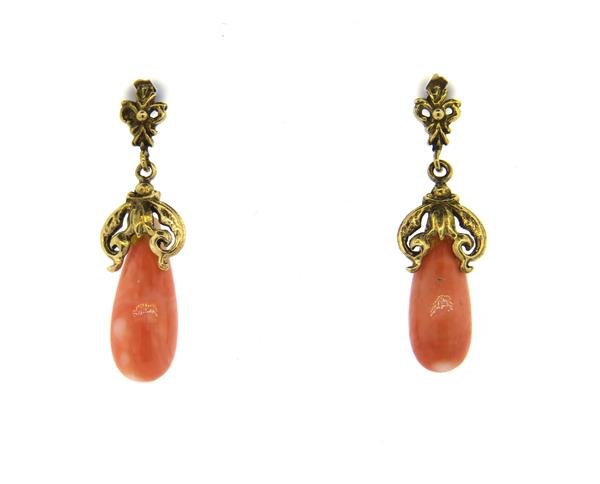 14k Gold Coral Teardrop Earrings: Earrings are 39mm x 11mm. Set with coral stones. Marked 14k. Weight - 7.4 grams.Gemstones have not been graded for color and clarity ,and tested for clarity and color enhancement, unless stated otherw