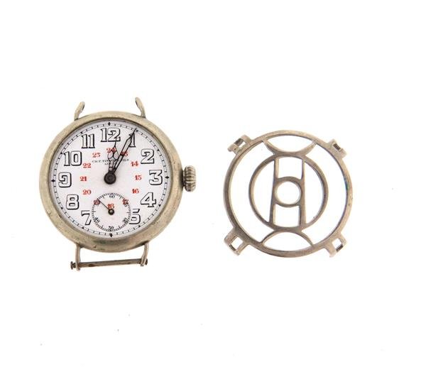 Tissot WWI Military Watch: Case - 34mm in diameter, protective case.Porcelain dial in very good condition. Not running.Gemstones have not been graded for color and clarity ,and tested for clarity and color enhancement, unless s