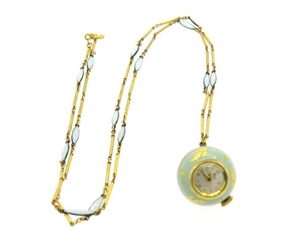 Bucherer Enamel Chain Watch Pendant: Watch case/ pendant is 20mm in diameter, dial is 11.8mm in diameter. Suspended on a 31" chain. Decorated with enamel. Manual wind movement - running order. Comes with Bucherer box.Gemstones have