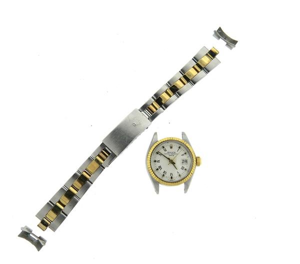 Rolex Oyster Perpetual 18k Gold Steel Watch ref. 6916: 18k gold and steel case - 25mm in diameter. Original crown, dial with roman numerals, date at 3 o'clock. Automatic movement - running order. Ref. 6916, serial 3995***. Band is detached.Gemstones h