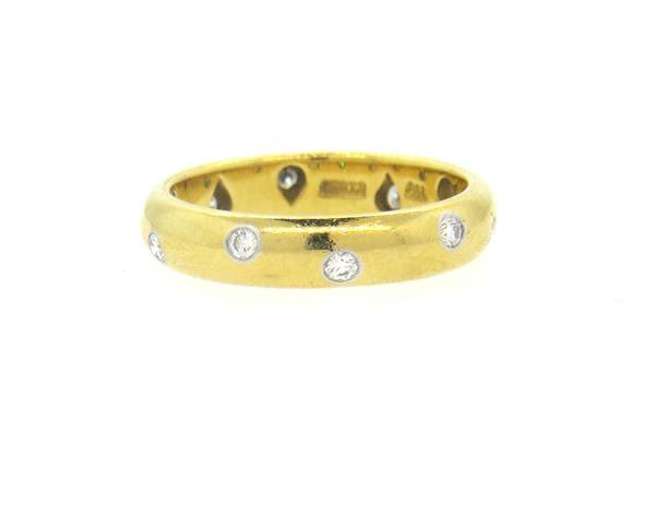 Tiffany & Co 18k Gold Platinum Diamond Etoile Band: Ring size 6 1/2, ring is 4.2mm wide. Decorated with approx. 0.20ctw in diamonds. Marked Tiffany & Co, 750, pt950. Weight - 5.4 grams.Gemstones have not been graded for color and clarity ,and teste