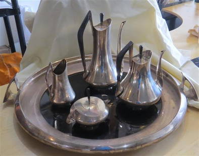 Modernist Gorham Sterling Colflesh 5pc Tea Set: Iconic 1970s coffee and tea set, designed by Donald Colflesh, manufactured by Gorham in 1958. Set includes a tray - measuring approx. 23&quot; in diameter of the top without handles, handles extend 2