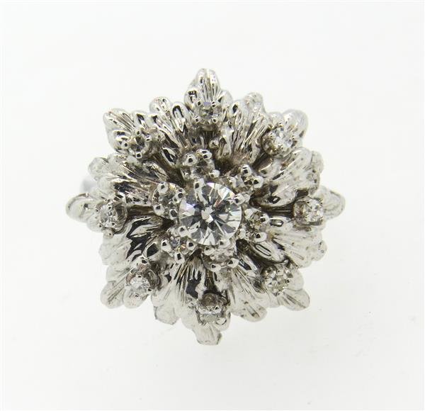 14k Gold Diamond Snowflake Cluster Ring: Ring size 7, ring top is 22mm x 21mm. Diamonds - approx. 0.61ctw. Marked 14k. Weight - 11.8 grams.Gemstones have not been graded for color and clarity ,and tested for clarity and color enhancement, un