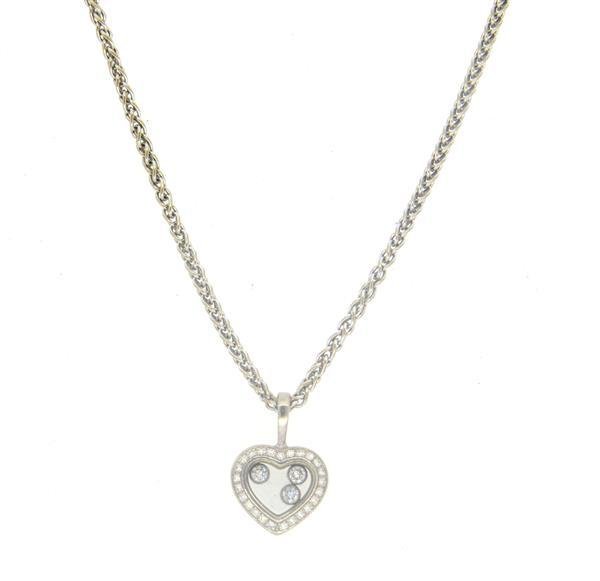 Chopard 18k Gold Diamond Floating Diamond Heart Pendant: Necklace is 17" long, pendant - 18mm x 13mm. Three floating diamonds and diamond bezel - total approx. 0.25ctw. Moisture in pendant behind crystal. Marked Swiss, 2188690, 79/4502, Chopard, 750. W