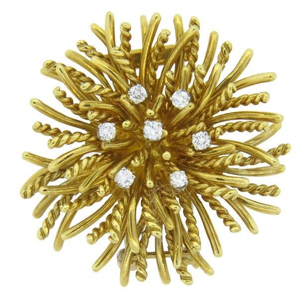 McTeigue Anemone Diamond 18k Gold Brooch Pendant: 18k gold brooch pendant by McTeigue, set with approximately 0.60ctw in G/VS diamonds. Brooch measures40mm in diameter. Marked with makers mark and 18k. weight of the piece - 25 grams.Gemstones have no