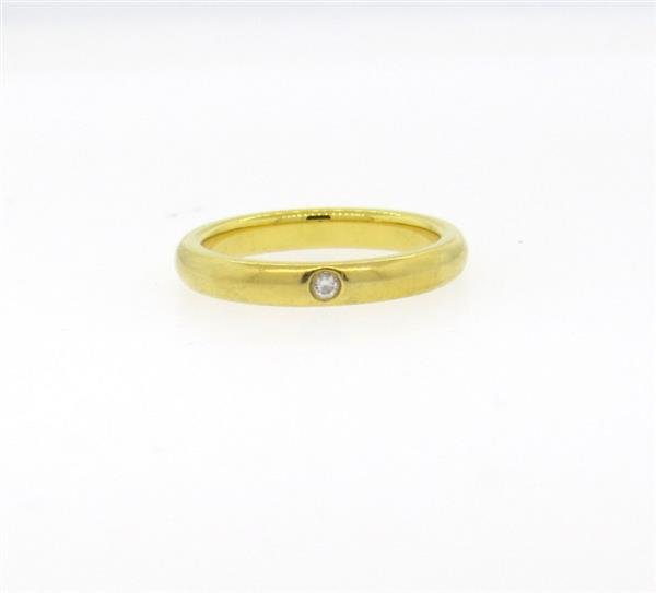 Tiffany & Co Peretti 18k Gold Diamond Wedding Band: Ring size 4 1/2, ring is 2.8mm wide. Set with one diamond - approx. 0.02ct. Marked: Tiffany & Co, Peretti,750. Retail $900. Comes with pouch. Weight - 3.7 grams.Gemstones have not been graded for