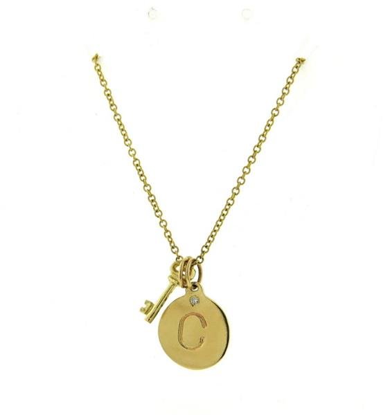 Helen Ficalora 14K Gold Diamond Letter C Key Pendant: Necklace features a key and letter C monogram pendant. Necklace measures 20" long. C pendant measures 15.8mm x 13.3mm. Key measures 15mm x 5mm (excluding bale). Marked H, Italy, 14K. Weight - 5.3