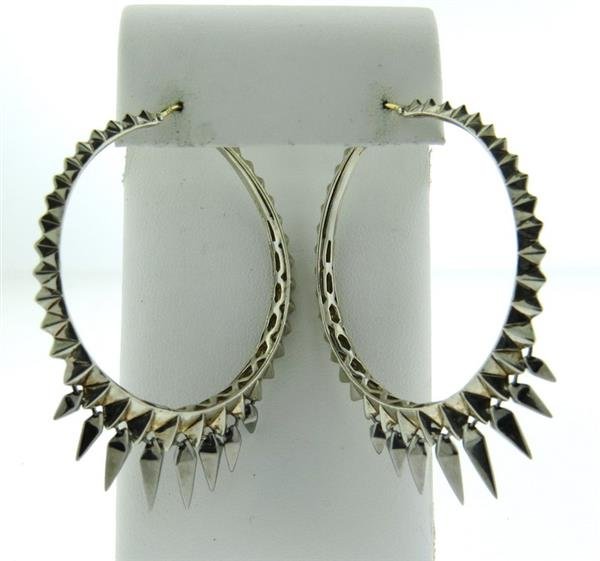 Stephen Webster Sterling Silver Large Hoop Earrings: Earrings measure 65mm long x 51mm. Marked with Webster hallmark, 925. Weight - 26.5 grams. Gemstones have not been graded for color and clarity ,and tested for clarity and color enhancement, unless st