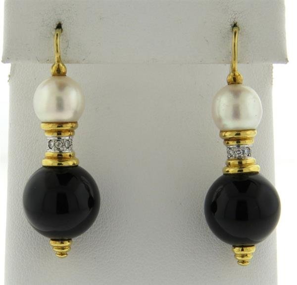 18k Gold Pearl Onyx Ball Diamond Earrings: Earrings are 43mm long. Pearls measure 9.2mm in diameter, onyx balls - 14mm in diameter, adorned with a total of 16 diamonds. Tested 18k. Weight - 14.5 grams.Gemstones have not been graded for color a