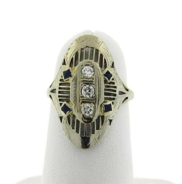 Art Deco 18k Gold Diamond Sapphire Ring: Ring size - 4 1/4, ring top is 22mm x 15mm. Decorated with sapphires (stones are abraded, one is chipped) and diamonds. Marked: 18k. Weight - 2.9 grams.Gemstones have not been graded for color and cla