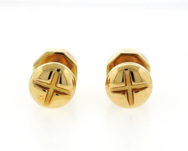 Tiffany & Co. 14K Gold Nuts and Bolts Cufflinks: Cufflink bolt top measures 12.5mm in diameter. Nut measures 12mmx 12mm. Marked Tiffany & Co. 585. Weight - 16.5 grams. Come with Tiffany pouch. Gemstones have not been graded for color and clarity