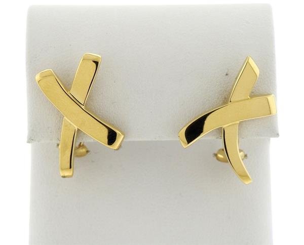 Tiffany & Co. Paloma Picasso 18K Gold X Earrings: METAL: 18K Gold. MEASUREMENTS: 27mm x 15mm. MARKED: Tiffany & Co., Paloma Picasso, 1984. WEIGHT: 11.0 grams. Gemstones have not been graded for color and clarity ,and tested for clarity and color 