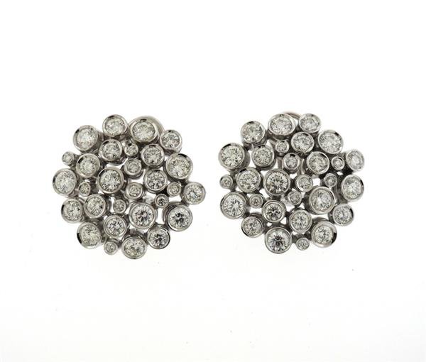 Antonini 18K Gold 5.50ctw Diamond Cocktail Earrings: METAL: 18K Gold. GEMSTONES: Diamonds total approx. 5.50ctw. MEASUREMENTS: 25mm in diameter. MARKED: A, 750. WEIGHT: 18.4 grams. Gemstones have not been graded for color and clarity ,and tested for cla