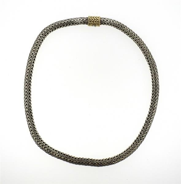 John Hardy Sterling 18k Gold Woven Chain Necklace: METAL: 18k gold and sterling silver. MEASUREMENTS: Necklace is 16 1/4" long and 6.4mm wide. MARKED: JH, 925, 18k. WEIGHT:56.4grams. Retail $495.Gemstones have not been graded for color and clarit