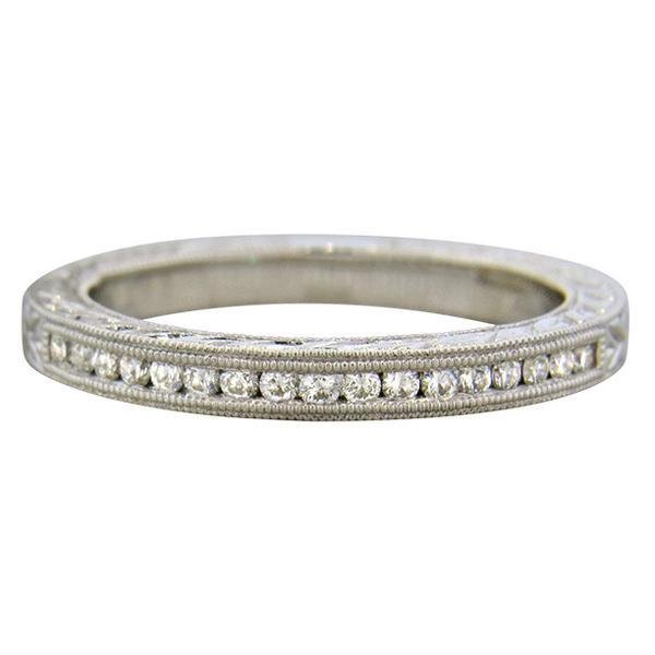 14K Gold Diamond Half Band Wedding Ring: METAL: 14k Gold. MEASUREMENTS: size 5.75, band measures 2.5mm wide. GEMSTONES: 0.17ctw of (SI/GH) diamonds. MARKED: 14k. WEIGHT: 3.2 grams. Gemstones have not been graded for color and clarity ,and te