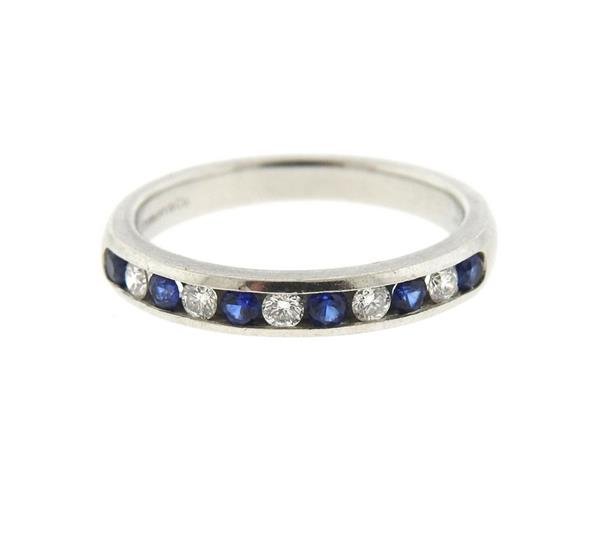 Tiffany & Co Platinum Diamond Sapphire Half Band: METAL: platinum. MEASUREMENTS: Ring size 6 1/2, ring is 3.2mm wide . GEMSTONES: Diamonds approx. 0.15ctw, blue sapphires . MARKED: Tiffany & Co, pt950. WEIGHT: 5.3 grams.Gemstones have not been gr