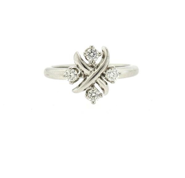 Tiffany & Co Schlumberger Lynn Platinum Diamond: METAL: platinum. MEASUREMENTS: ring size - 4 1/4, ring top is 10mm x 10mm. GEMSTONES: diamonds 0.20ctw. MARKED: Schlumberger studios, Tiffany & Co, pt950. Retail $2800. WEIGHT: 4.6 grams.Gemstones