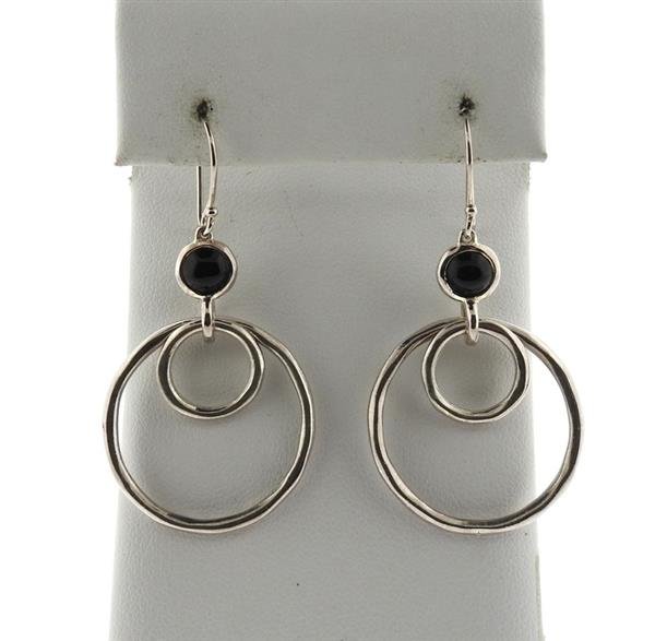 Ippolita Sterling Onyx Circle Drop Earrings: METAL: sterling silver. MEASUREMENTS: earrings are 50mm long with wire x 26mm in diameter of bottom circle. GEMSTONES: onyx. MARKED: Ippolita 925. WEIGHT: 8.3 grams.Gemstones have not been graded for 
