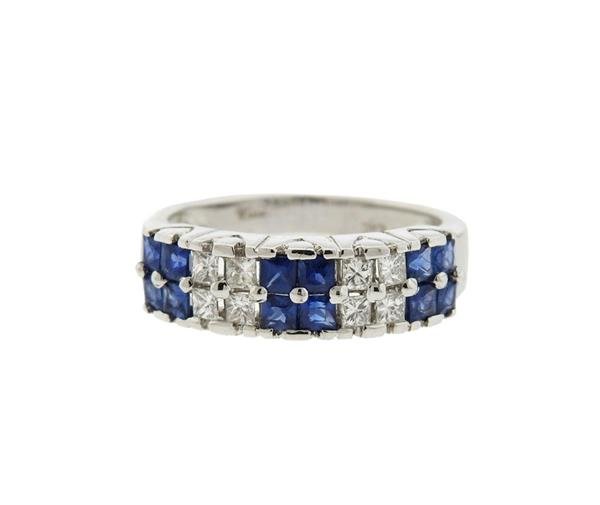 18K Gold Diamond Sapphire Band Ring: METAL: 18K gold. GEMSTONES: diamonds- approx. 0.24ctw, sapphires. MEASUREMENTS: ring size 5.5, band is 5.9mm wide. MARKED: UJ CAC 750.WEIGHT: 4.3 grams. Gemstones have not been graded for color and cl