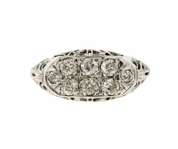 Art Deco Filigree 14K Gold Diamond Ring: METAL: 14K gold. GEMSTONES: diamonds-approx. 0.50ctw. MEASUREMENTS: ring size 6. Ring top is 15.2mm x 8.7mm at widest point. TESTED: 14K. WEIGHT: 2.7 grams. Gemstones have not been graded for color an