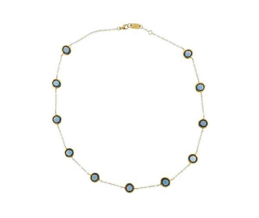 Ippolita 18K Gold Blue Topaz Station Necklace: METAL: 18K gold. GEMSTONES: london blue topaz. MEASUREMENTS: necklace is 18" long x 19mm at widest point. MARKED: Ippolita 18K. WEIGHT: 11.7 grams. Necklace comes with pouch.Gemstones have not be