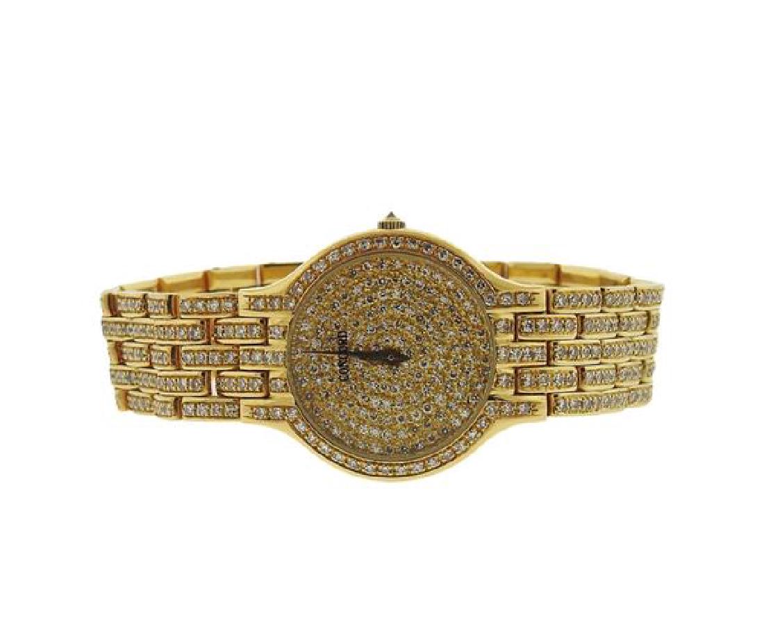 Concord 18k Gold Diamond Watch: METAL: 18k gold. MEASUREMENTS: Case is 25mm in diameter (excl. crown). DIAL: diamond dial. MOVEMENT: Quartz, not in running order. WEIGHT: 65.1 grams. Gemstones have not been graded for color and clar