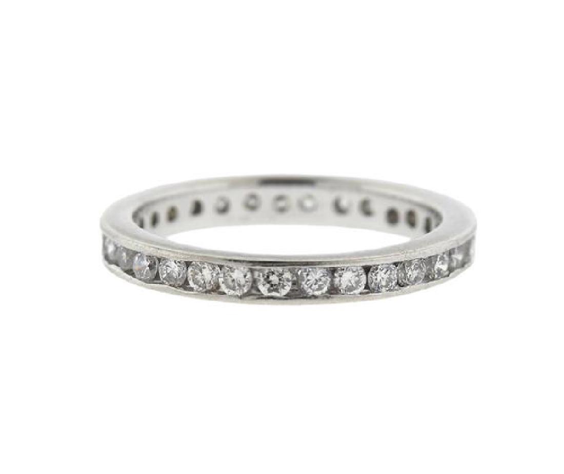 Platinum Diamond Eternity Wedding Band Ring: METAL: platinum. GEMSTONES: diamonds-approx. 0.30ctw. MEASUREMENTS: ring size 5. Band iz 2.5mm wide. TESTED: platinum. WEIGHT: 3.4 grams. Gemstones have not been graded for color and clarity ,and test