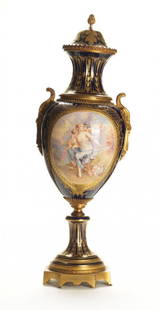 SEVRES VASE: An important blue and gold decorated Sevrès ceramic vase with romantic scene, H cm 74, France, Napoleon III, end of XX century