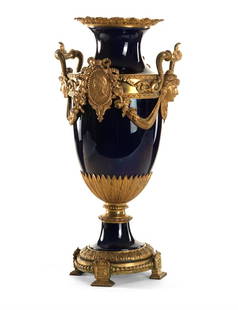 SEVRES VASE: Blue porcelain vase with golden bronze decoration. H cm 53