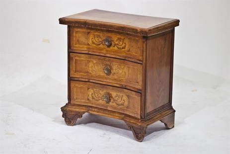 BEDSIDE TABLE: A bedside table with three drawers