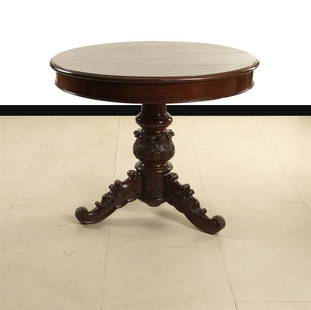 TABLE: A mahogany round table, H cm 80, diam. cm 92, France XIX century