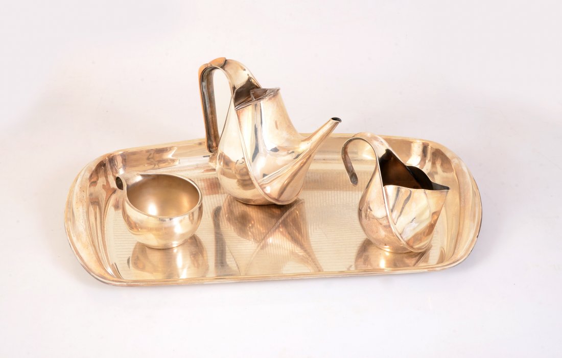 Tousquet Oscar: Tea set made of silvery and golden metal, produced by Officina Alessi, 1984, tray 2x20,70x14,20 in, teapot H 8,30 in