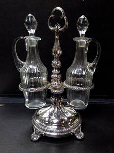 Oil cruet: Silver oil cruet, XVIII century style, cm 32, silver weight about gr. 400, Italy, end of XIX century.