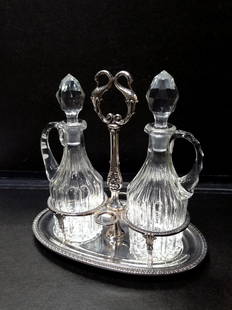 Oil cruet: Silver and crystal oil cruet, cm 20, silver weight about gr. 210, Italy, first half of XX century.