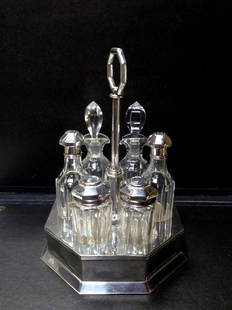 Oil cruet: Silver oil cruet Cesa label, first half XX century, silver weight about gr. 920, H cm 26,5