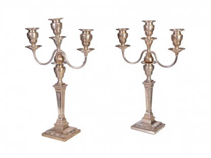 Couple of candelholders: Couple of important silver candleholders with three flames, English marks, early XX century, total weight about gr. 3600, H cm 39